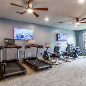 fitness center room with treadmills