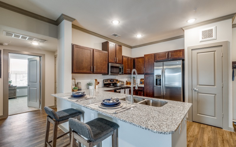 A kitchen with stainless steel appliances at Alders Cross Creek