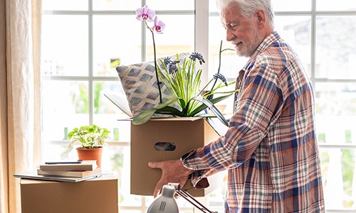man holding a plant
